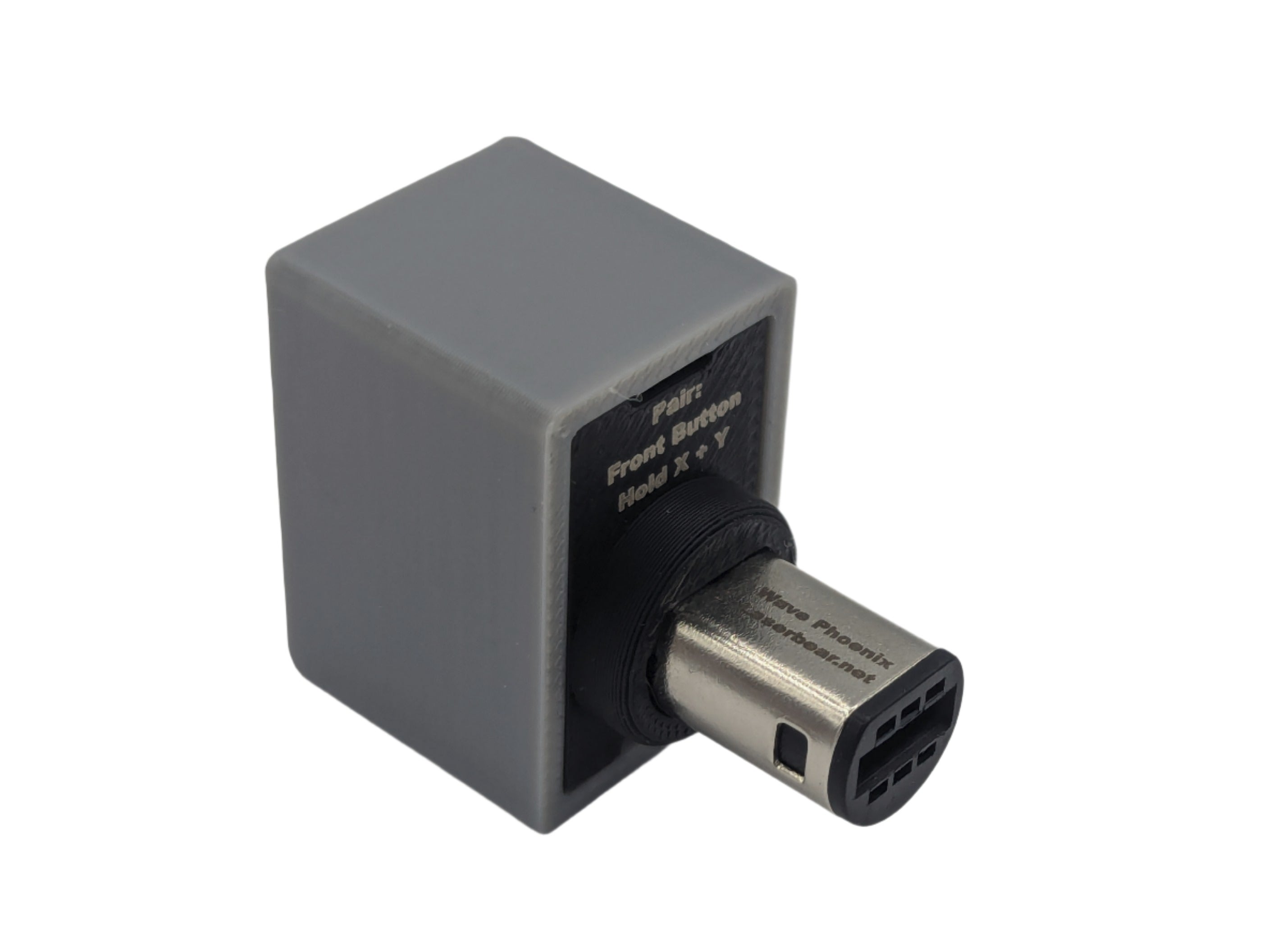 Shows the rear side of the adapter that has text 
Pair:
Front Button
Hold X + Y
